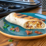 El Monterey Egg Applewood Smoked Bacon & Cheese Frozen Breakfast Burrito on a plate