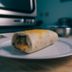 El Monterey Egg Cheese & Jalapeño Frozen Breakfast Burrito on a plate