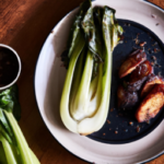 roasted old bay seaonsing and balsalmic vinegar bok choy on a plate