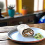 Sweet Earth Vegetarian Baja Breakfast Burrito on a plate