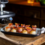 bacon wrapped scallops on a plate